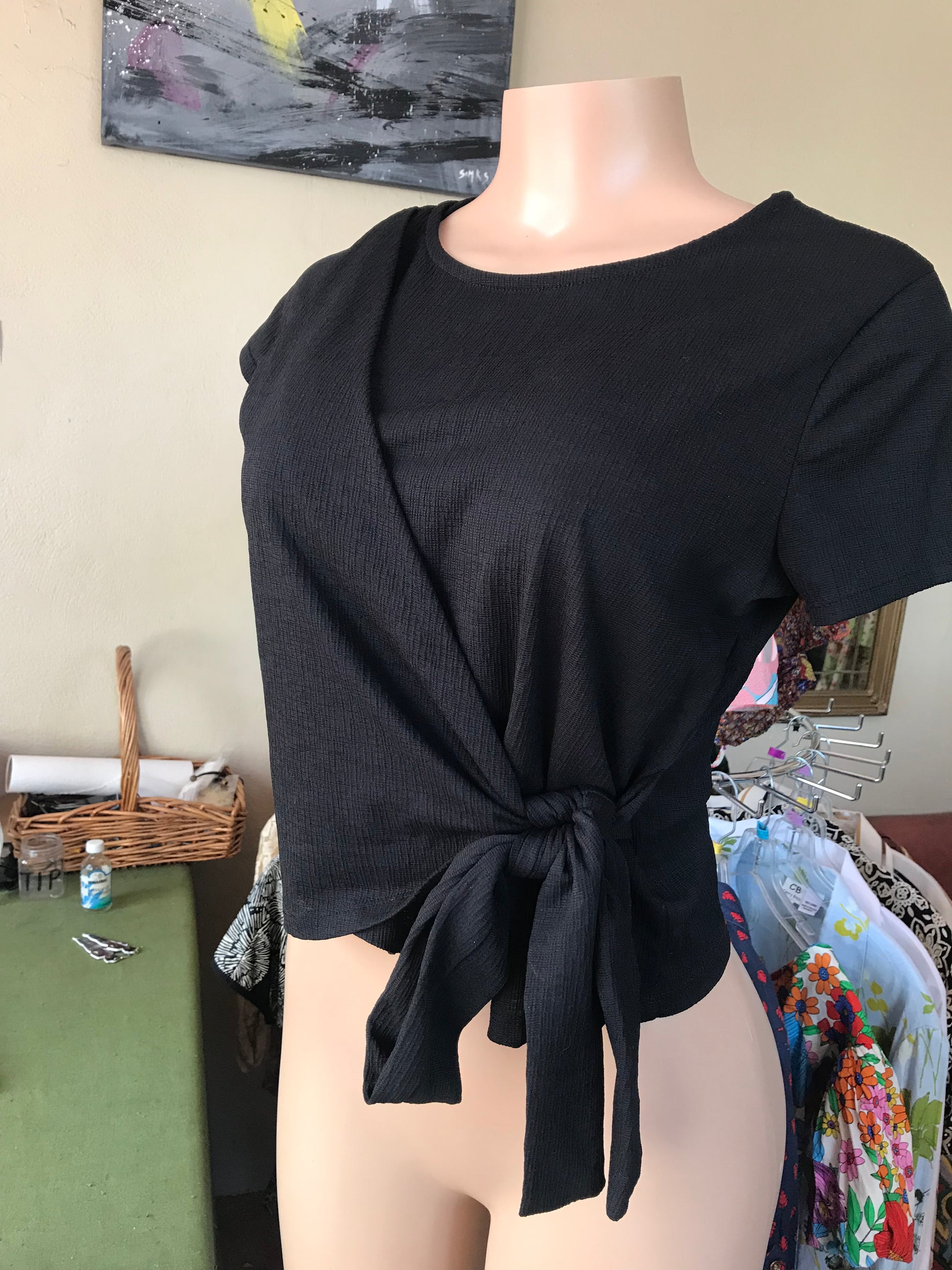 Stretchy black wrap top tied