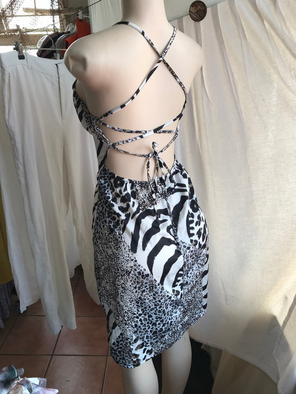 Silky animal print evening dress strappy back . L