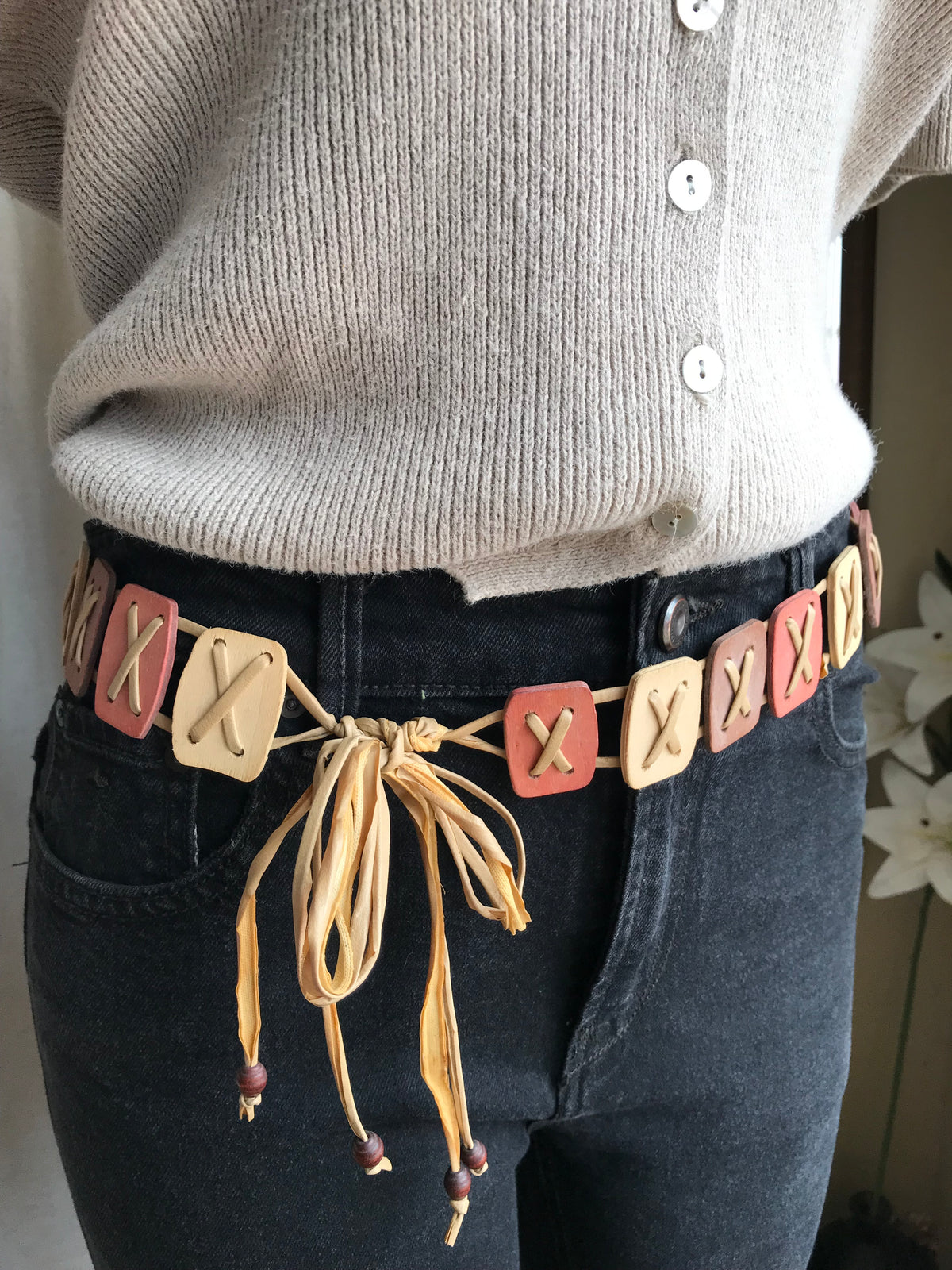 Vintage blush pastel wooden belt tied