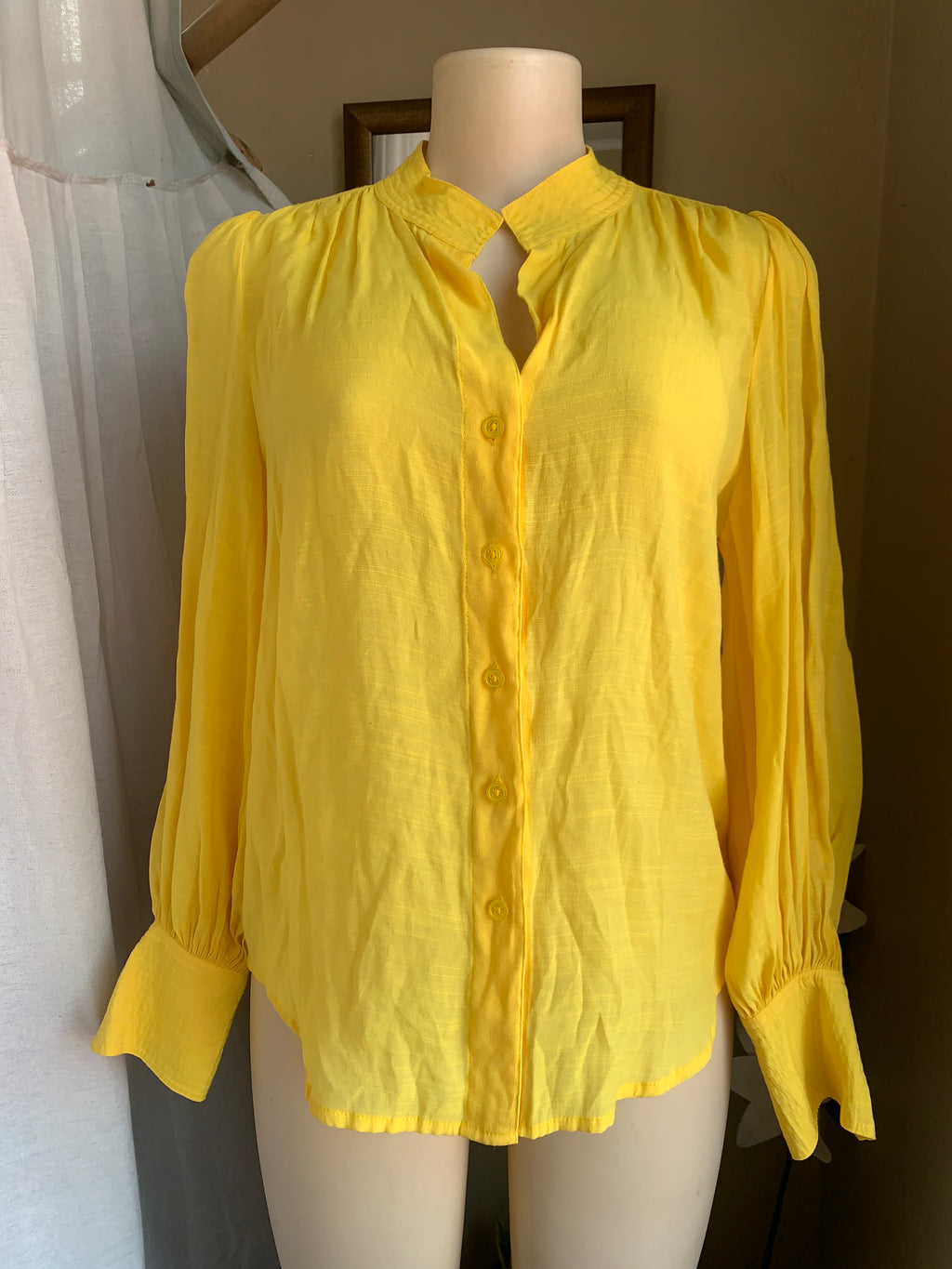 Banana Republic yellow slinky bottom down with detailed neckline … says s