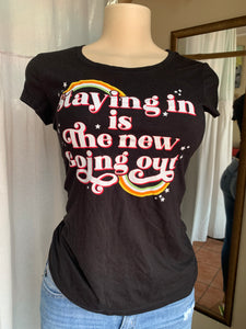 Black “staying in is the new going out” graphic tee … s