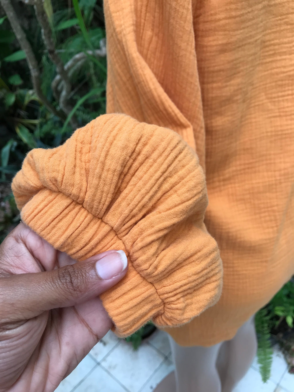orange cotton short romper textured long sleeve ~~~ m to large ,,,