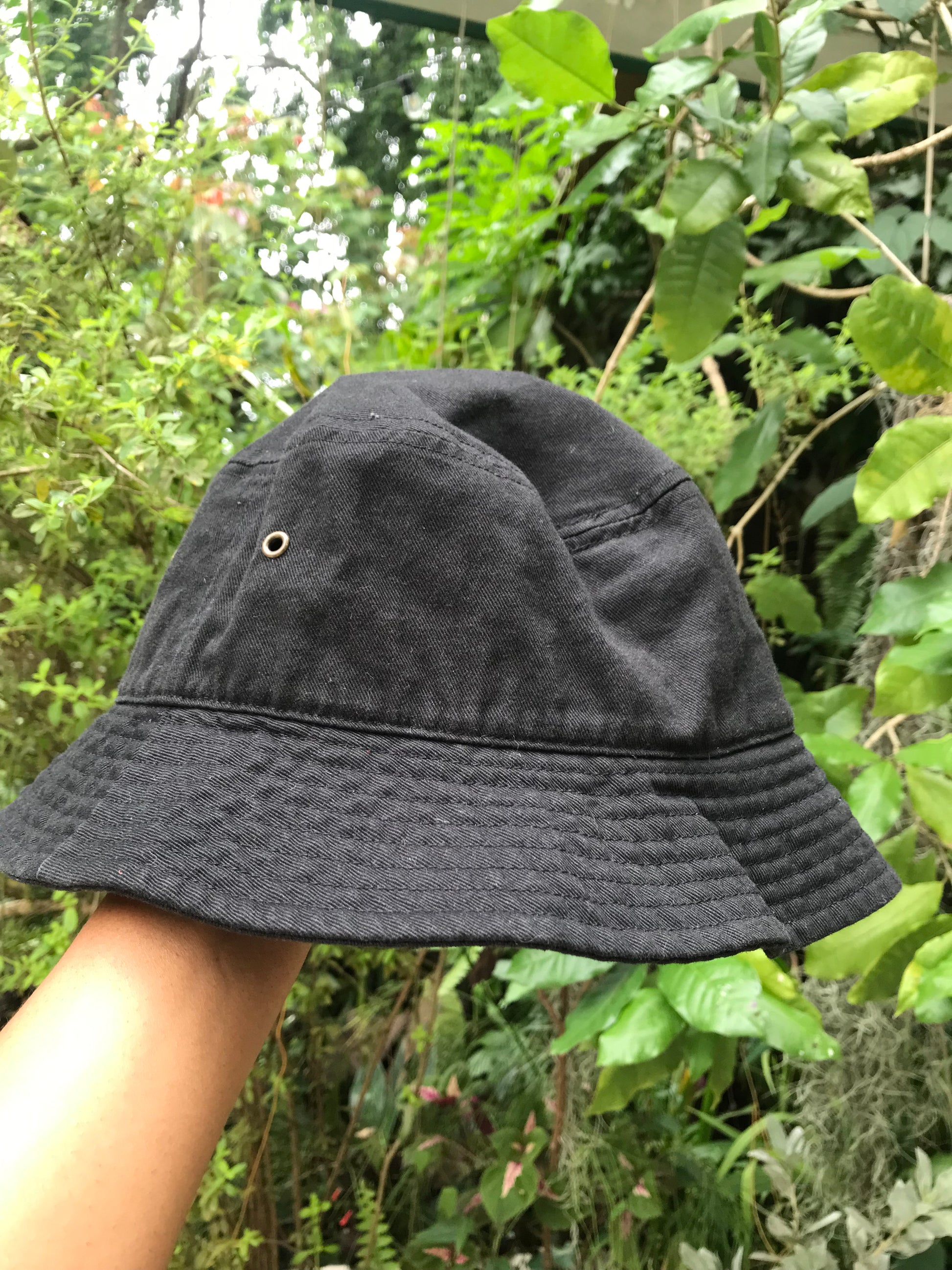 Black bucket hat.