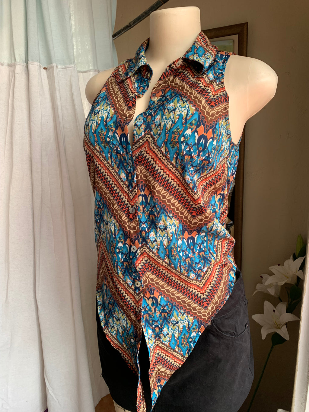 Tribal print sleeveless button down blouse … s