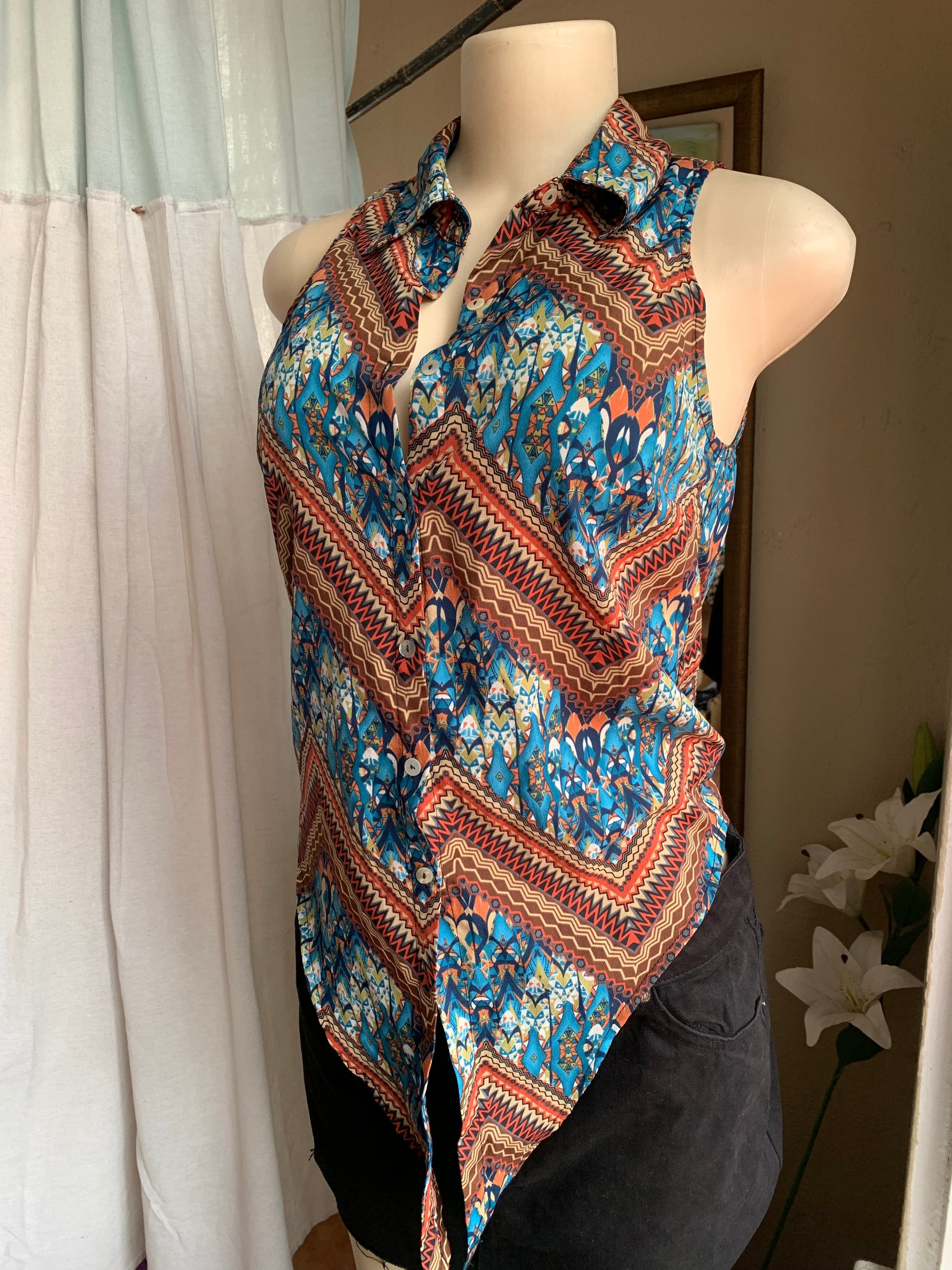 Tribal print sleeveless button down blouse … s