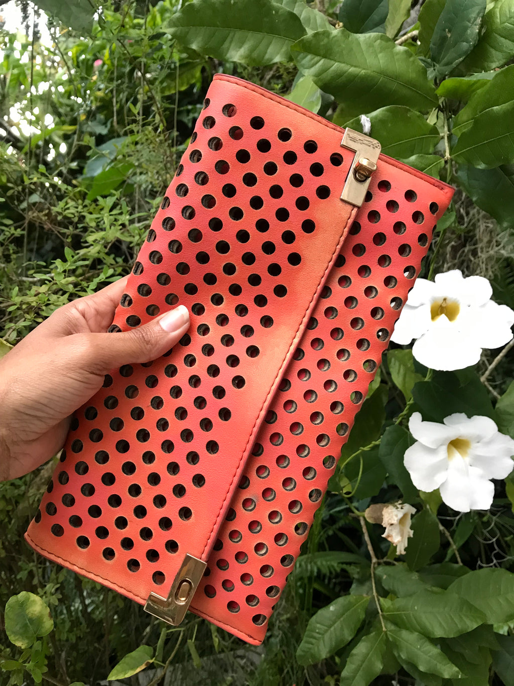 orange eyelet clutch purse large