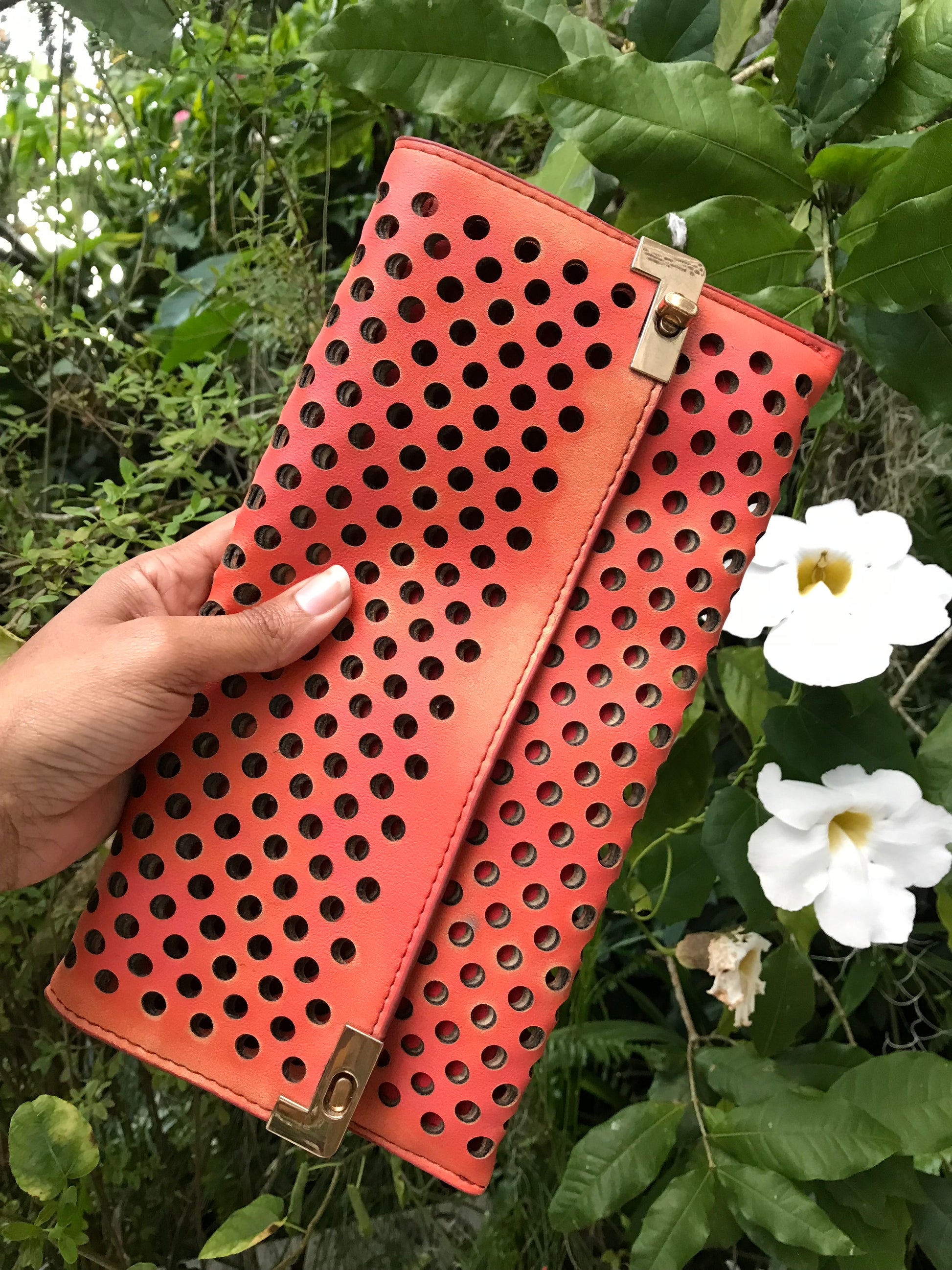 orange eyelet clutch purse large