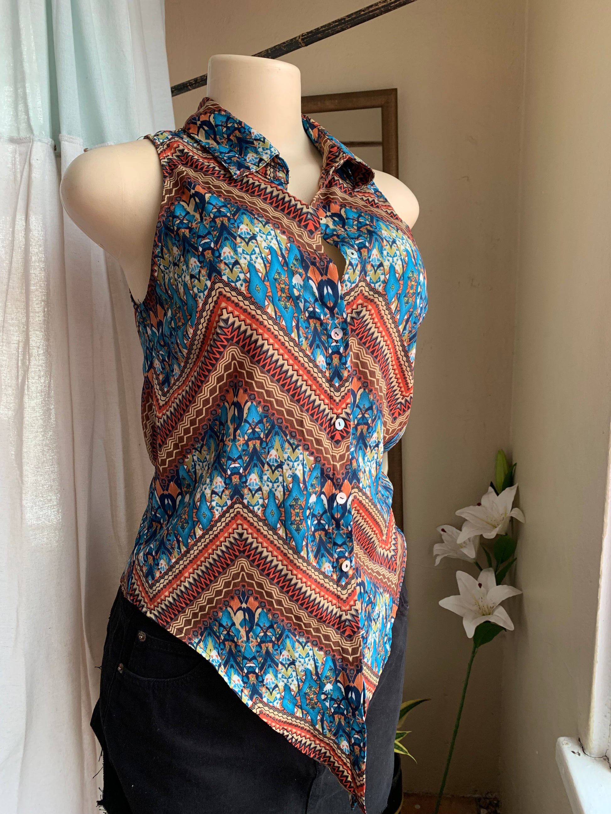 Tribal print sleeveless button down blouse … s