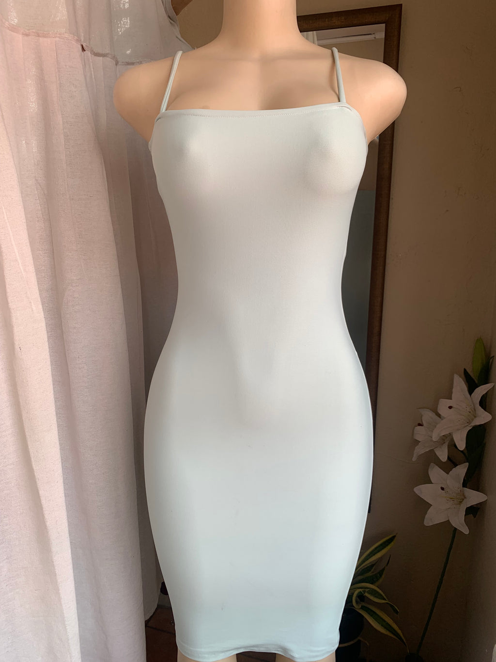 Mint green body con dress with straight neckline s/M has stretch