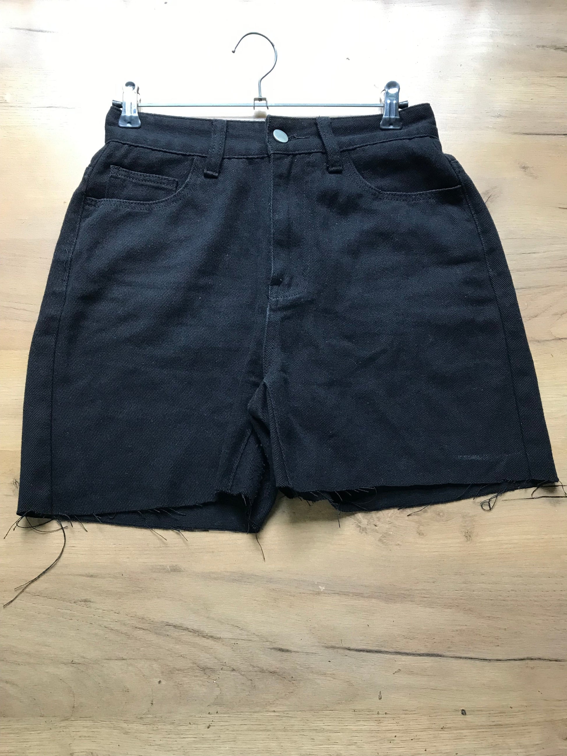 Black high waist cutoff shorts . XS/ w26
