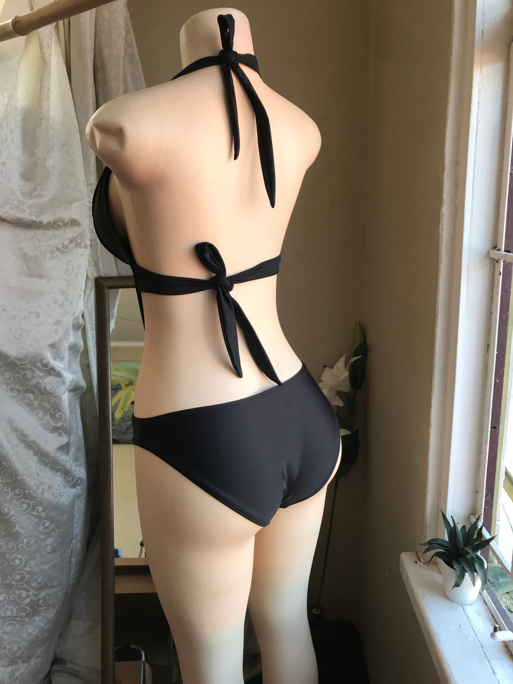 Black one piece cutout swim metal detail L