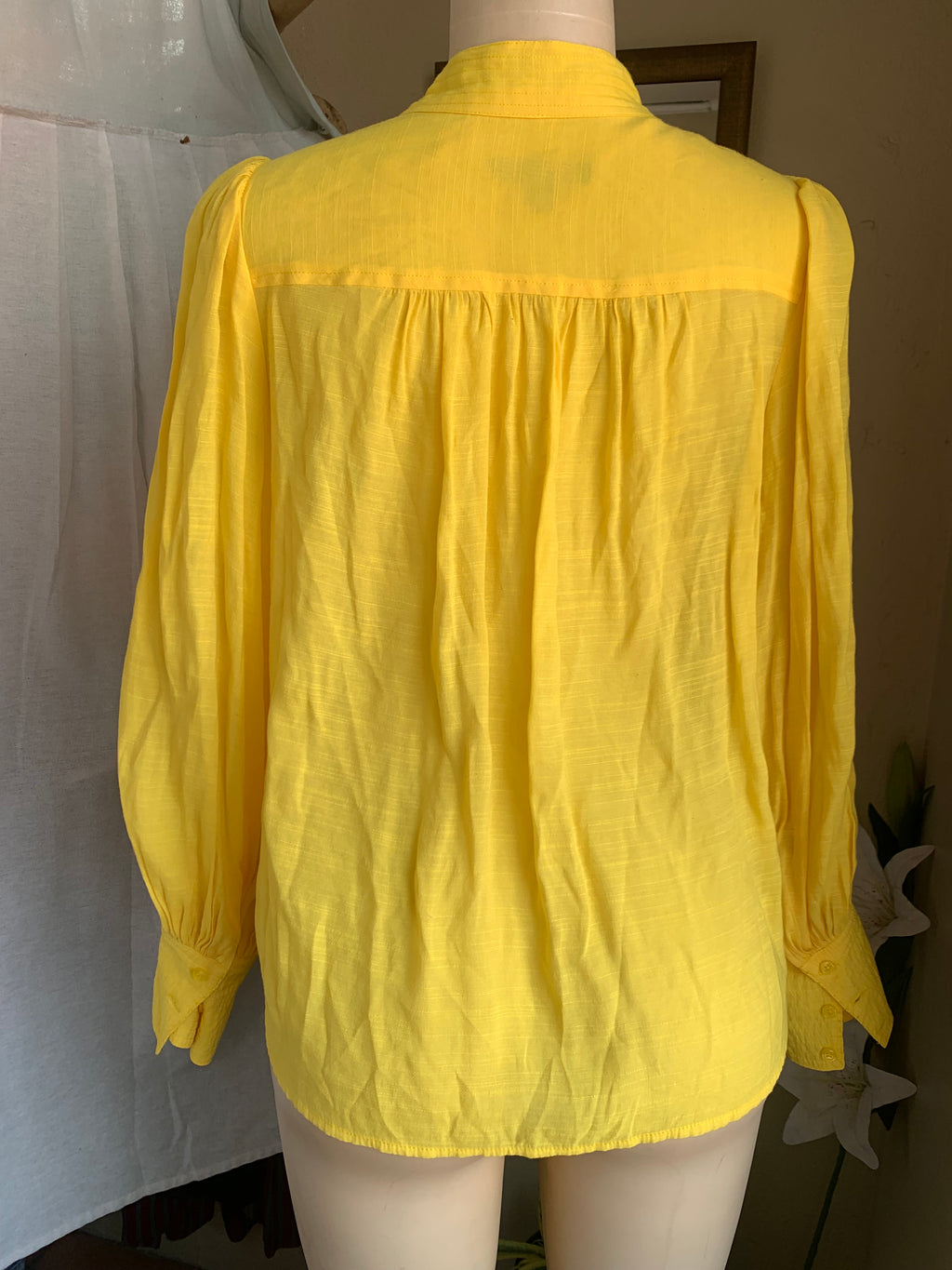 Banana Republic yellow slinky bottom down with detailed neckline … says s