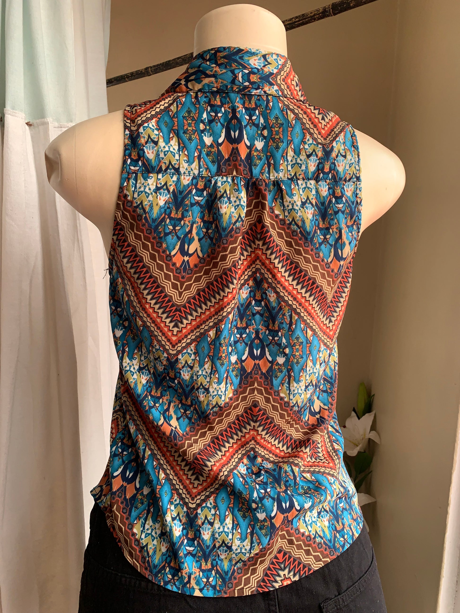 Tribal print sleeveless button down blouse … s