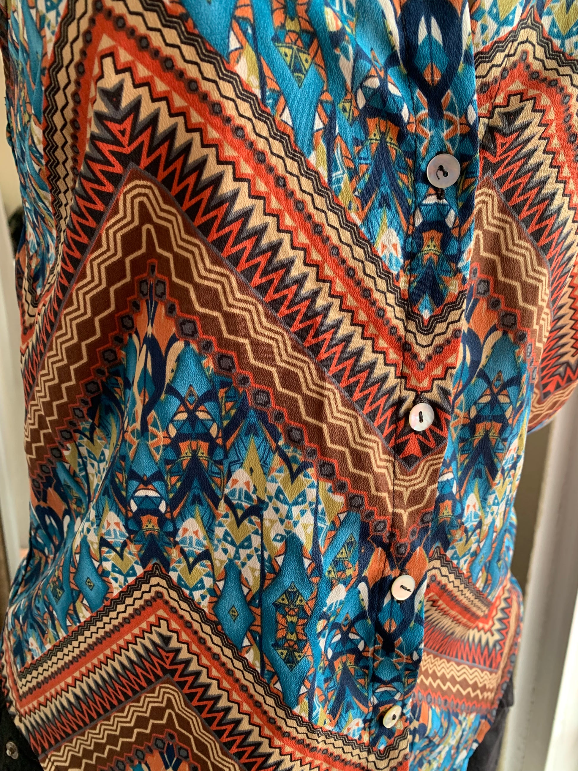Tribal print sleeveless button down blouse … s