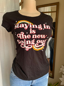 Black “staying in is the new going out” graphic tee … s