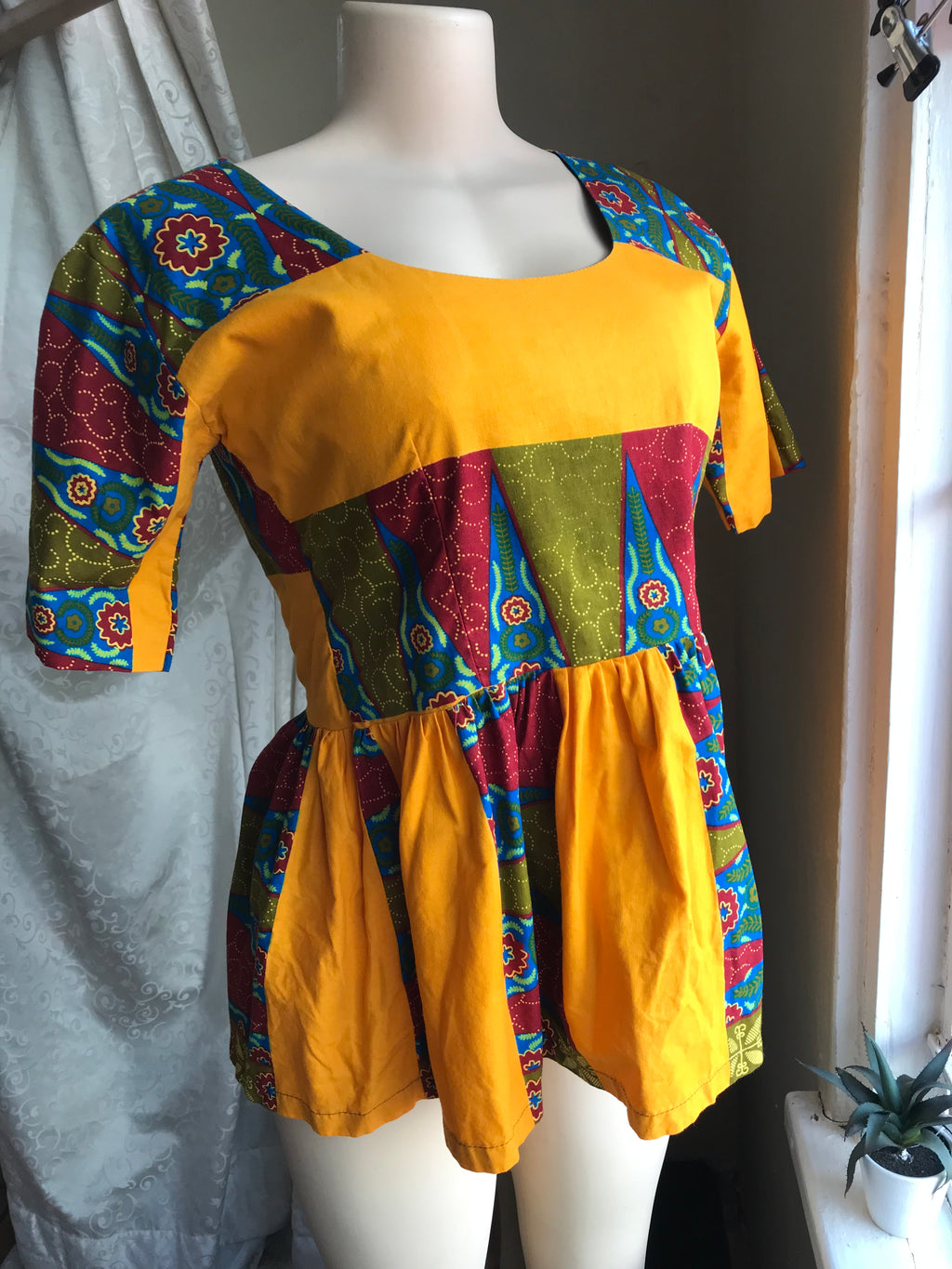African mustard peplum blouse... size s/m