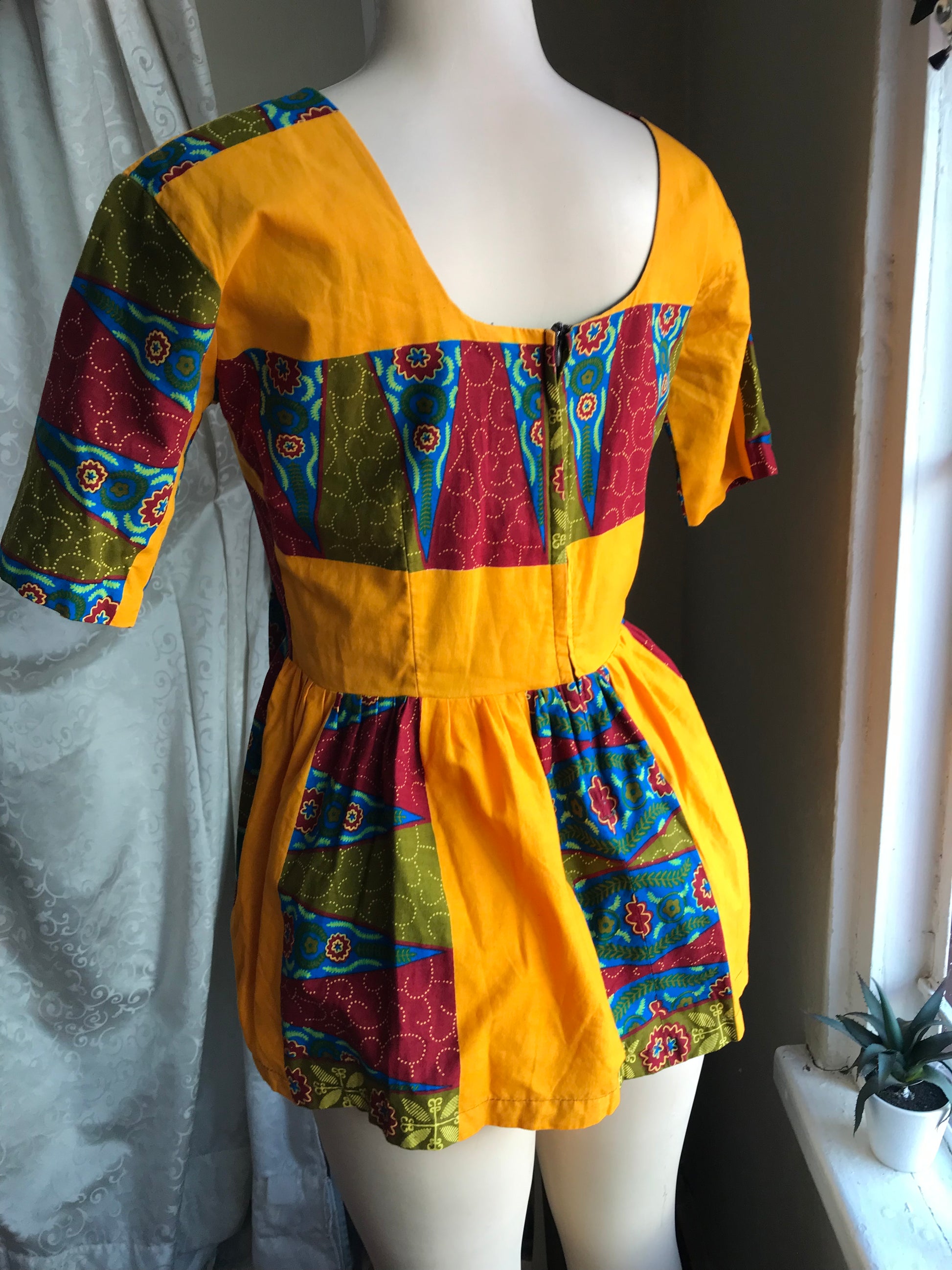 African mustard peplum blouse... size s/m