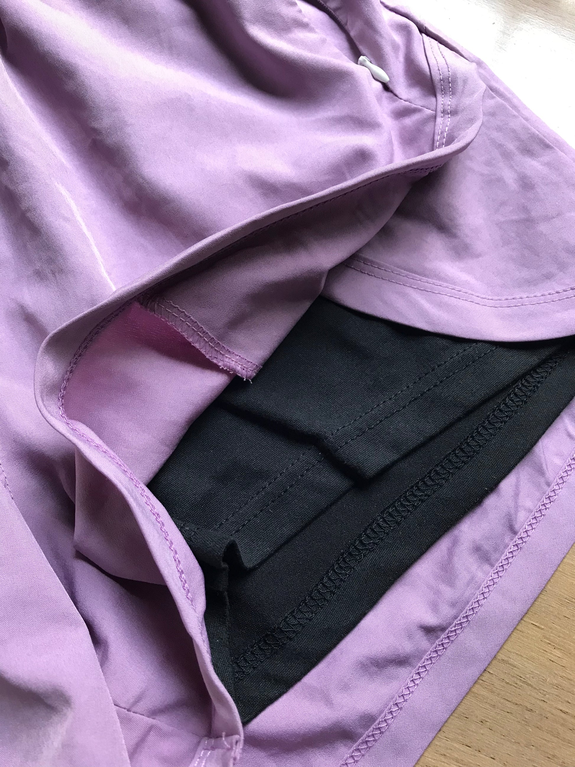 new purple exercise shorts lined . M