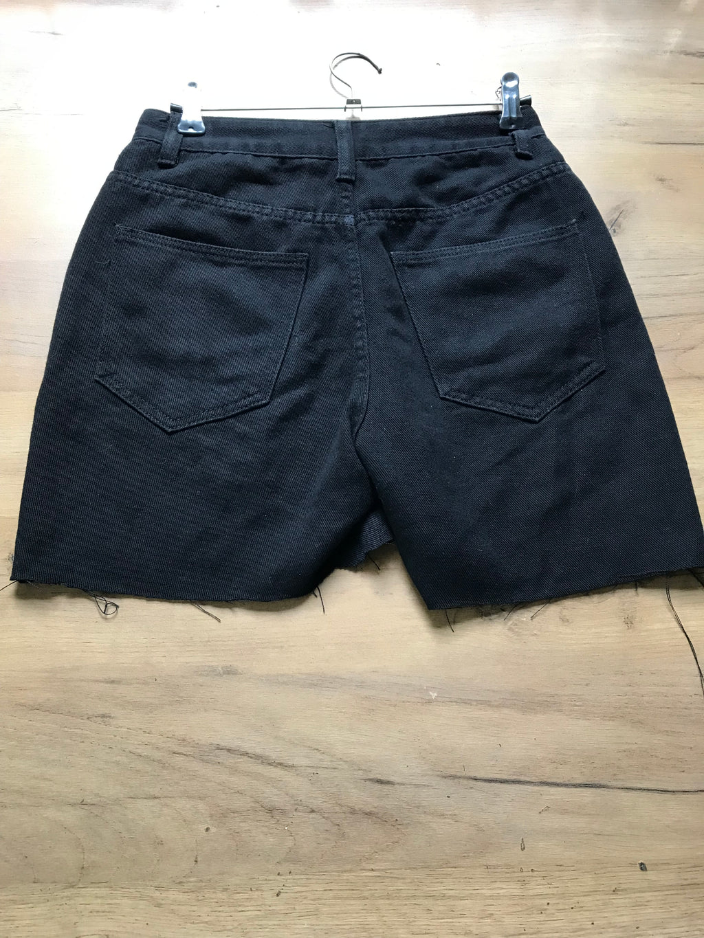 Black high waist cutoff shorts . XS/ w26