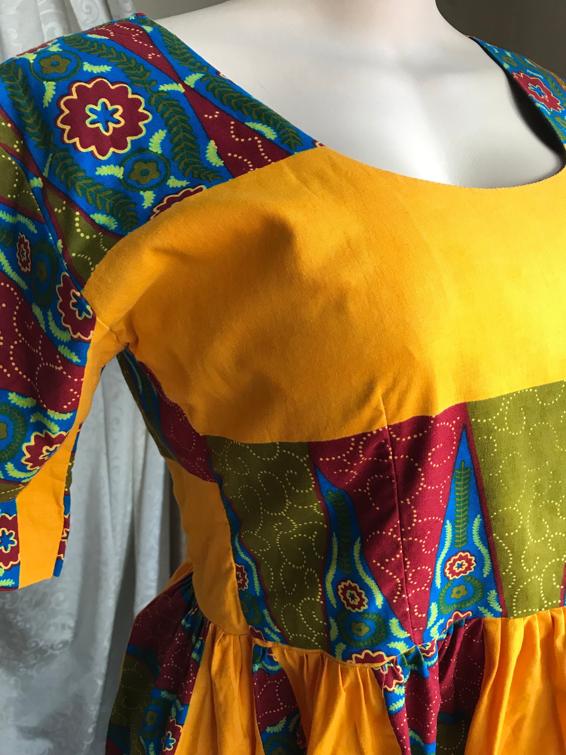 African mustard peplum blouse... size s/m