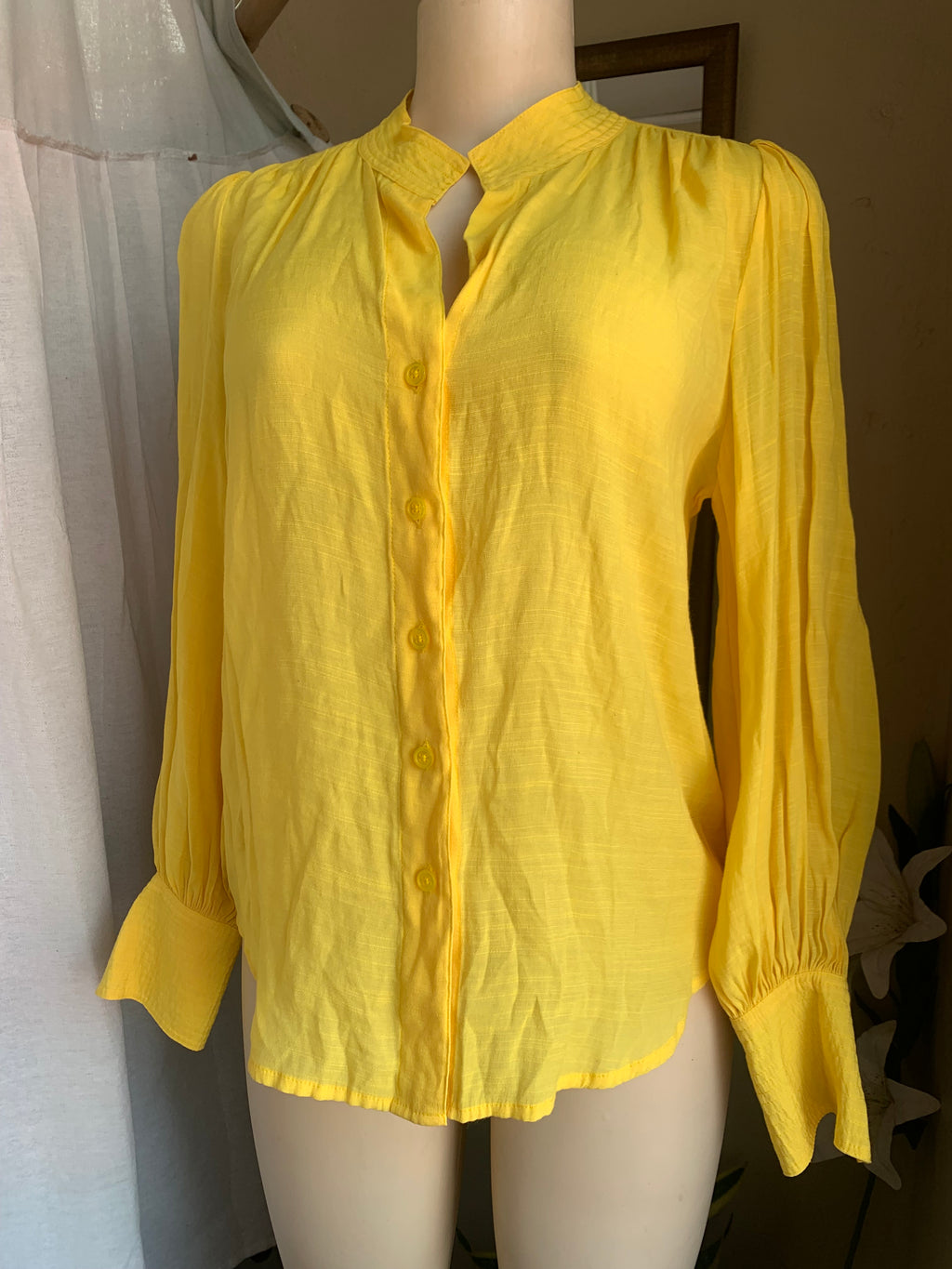 Banana Republic yellow slinky bottom down with detailed neckline … says s