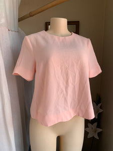 Pastel pink wave trim blouse with button down back detail … s