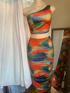 Multicolored orange one shoulder two piece skirt set… Slll