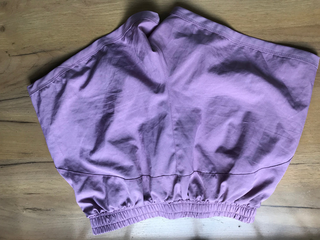 new purple exercise shorts lined . M