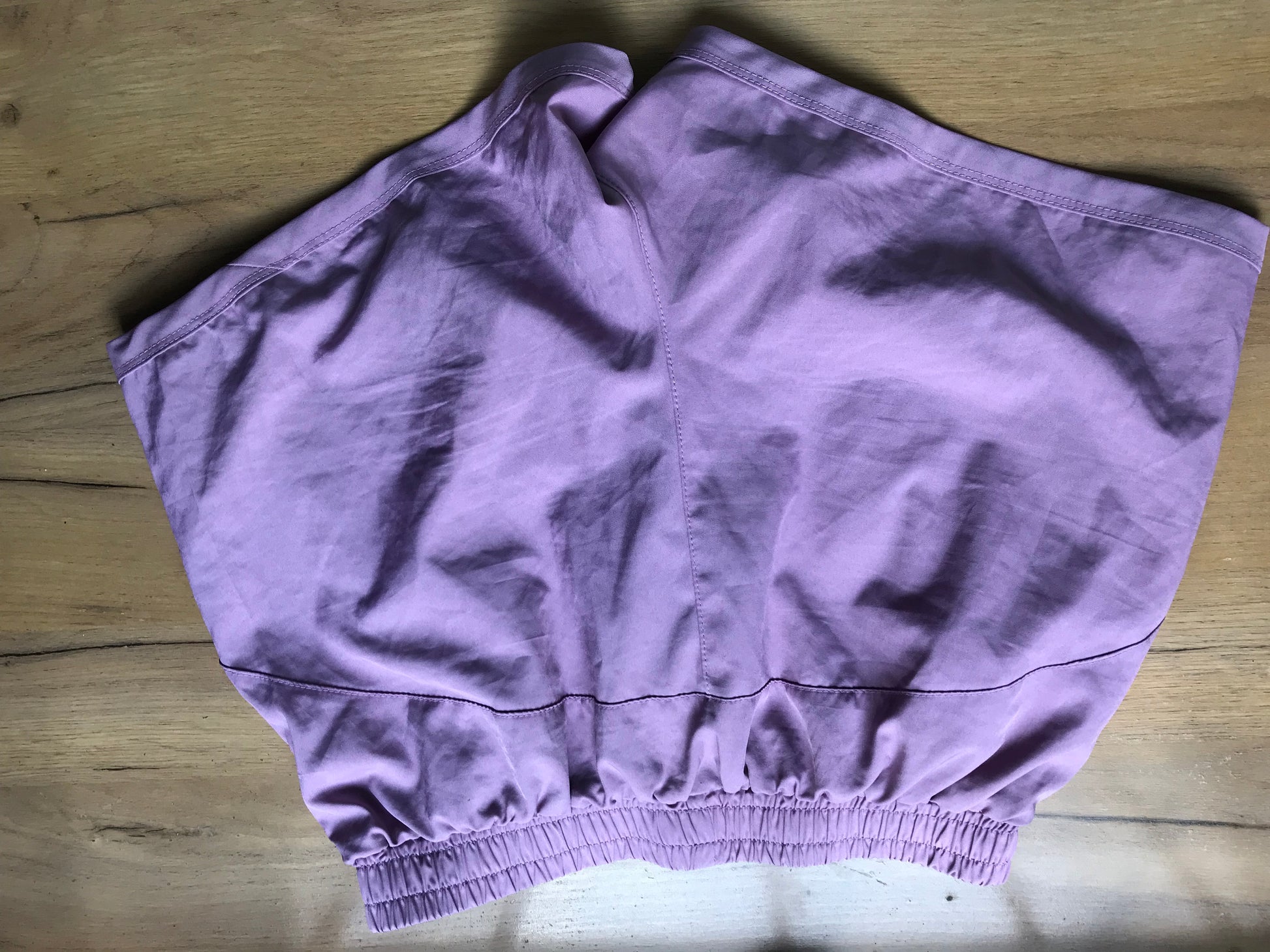 new purple exercise shorts lined . M