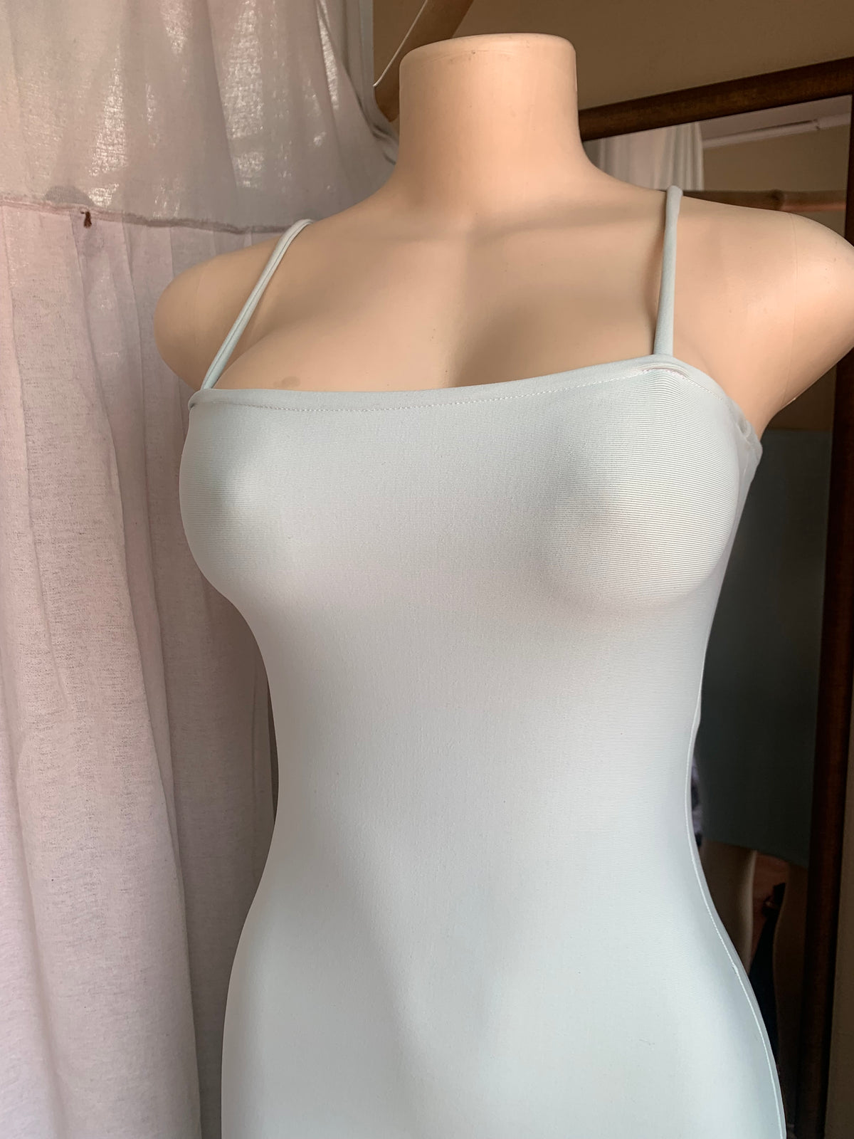 Mint green body con dress with straight neckline s/M has stretch