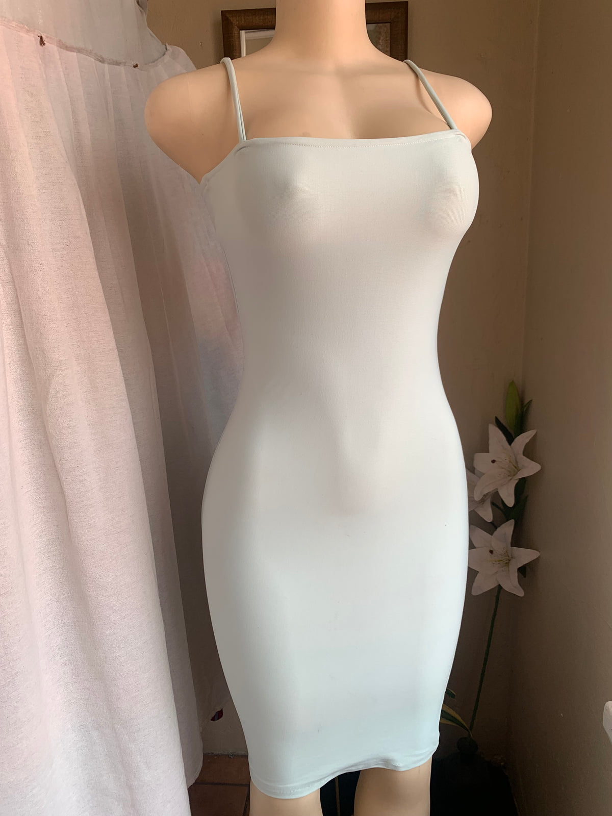 Mint green body con dress with straight neckline s/M has stretch