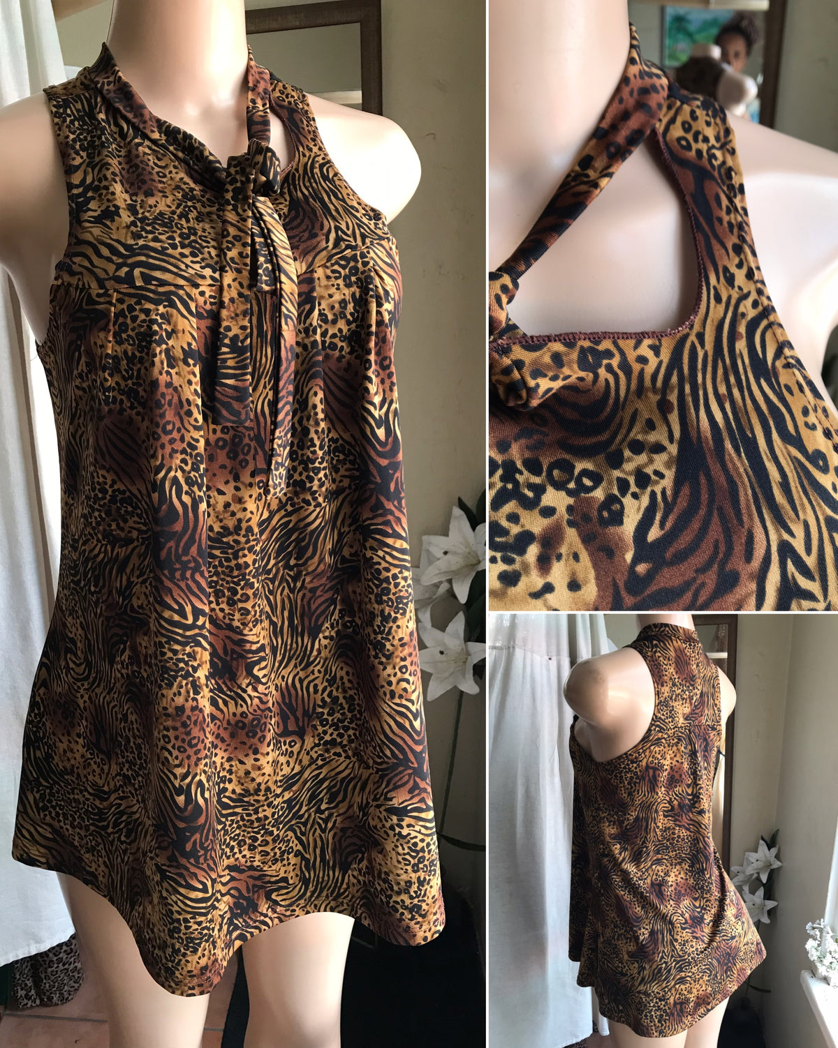 cheetah sleeveless cutaway top ... Large