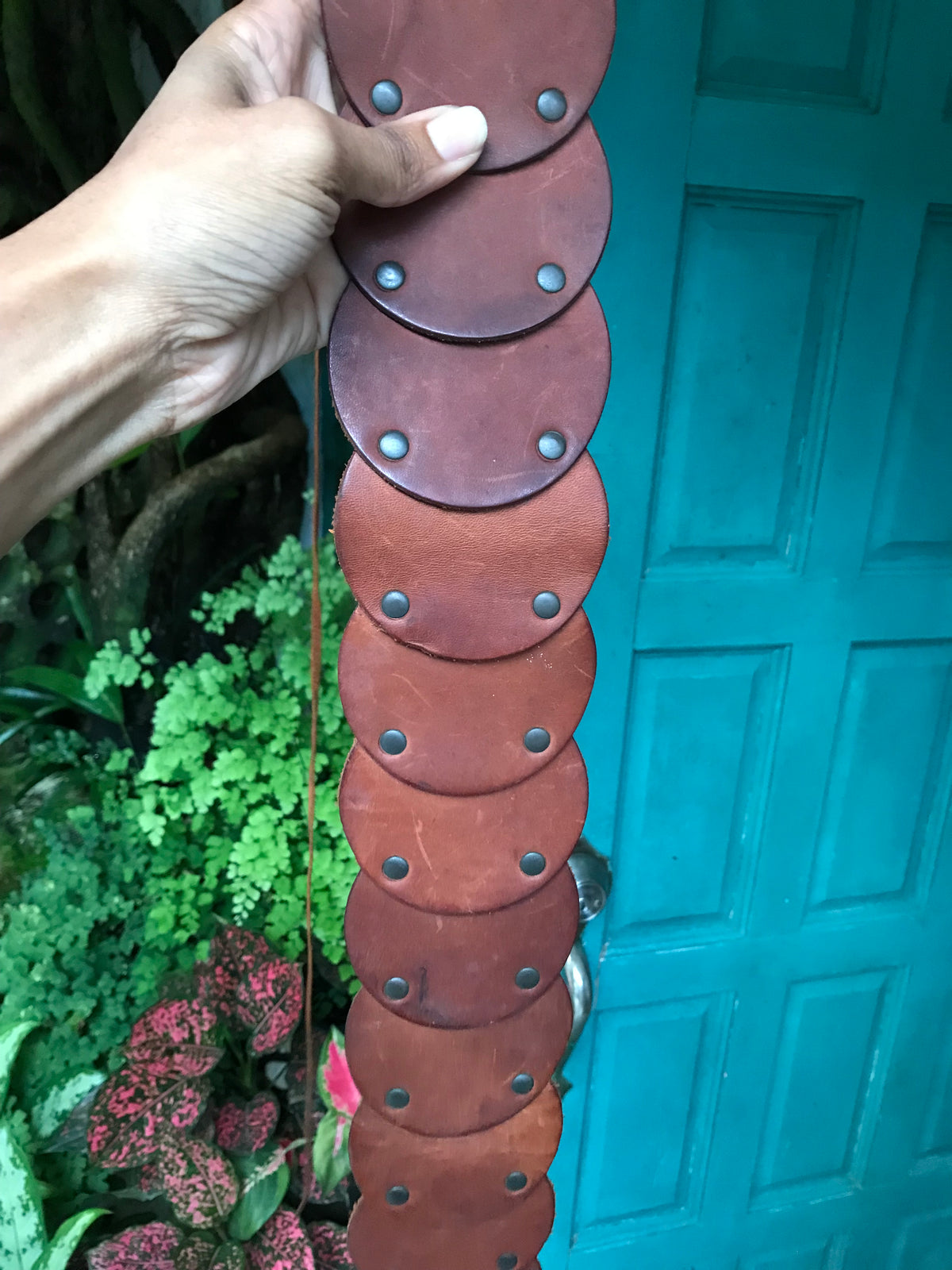 Y2K leather disk belt tied . one size