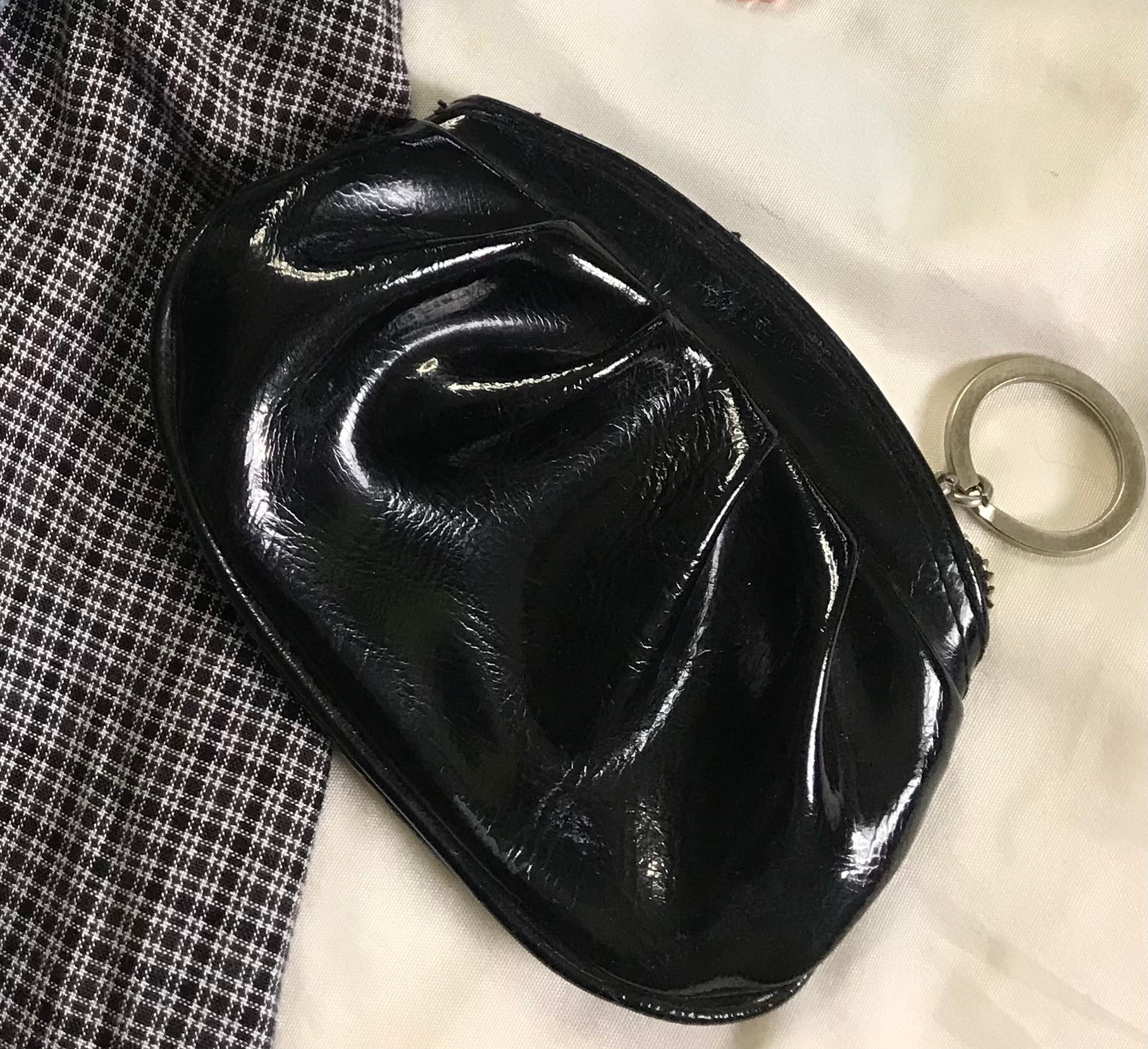 black shiny coin purse