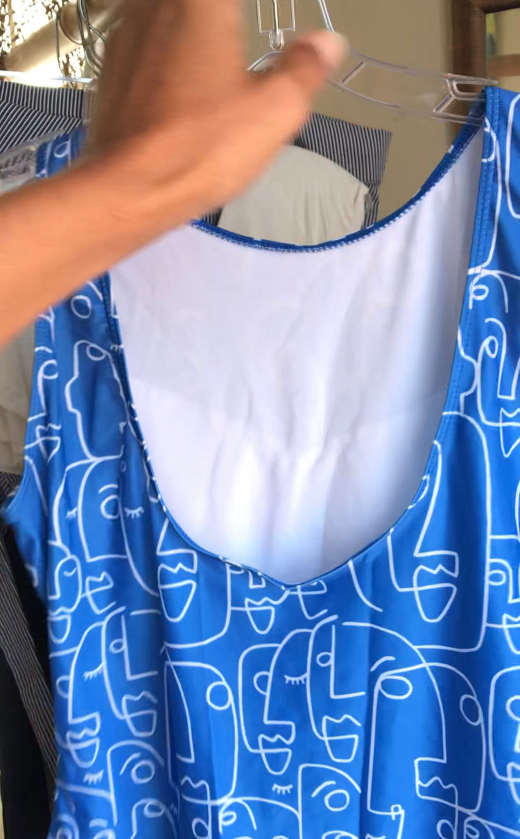 Like new sea blue squiggle faces one piece swim suit /xl
