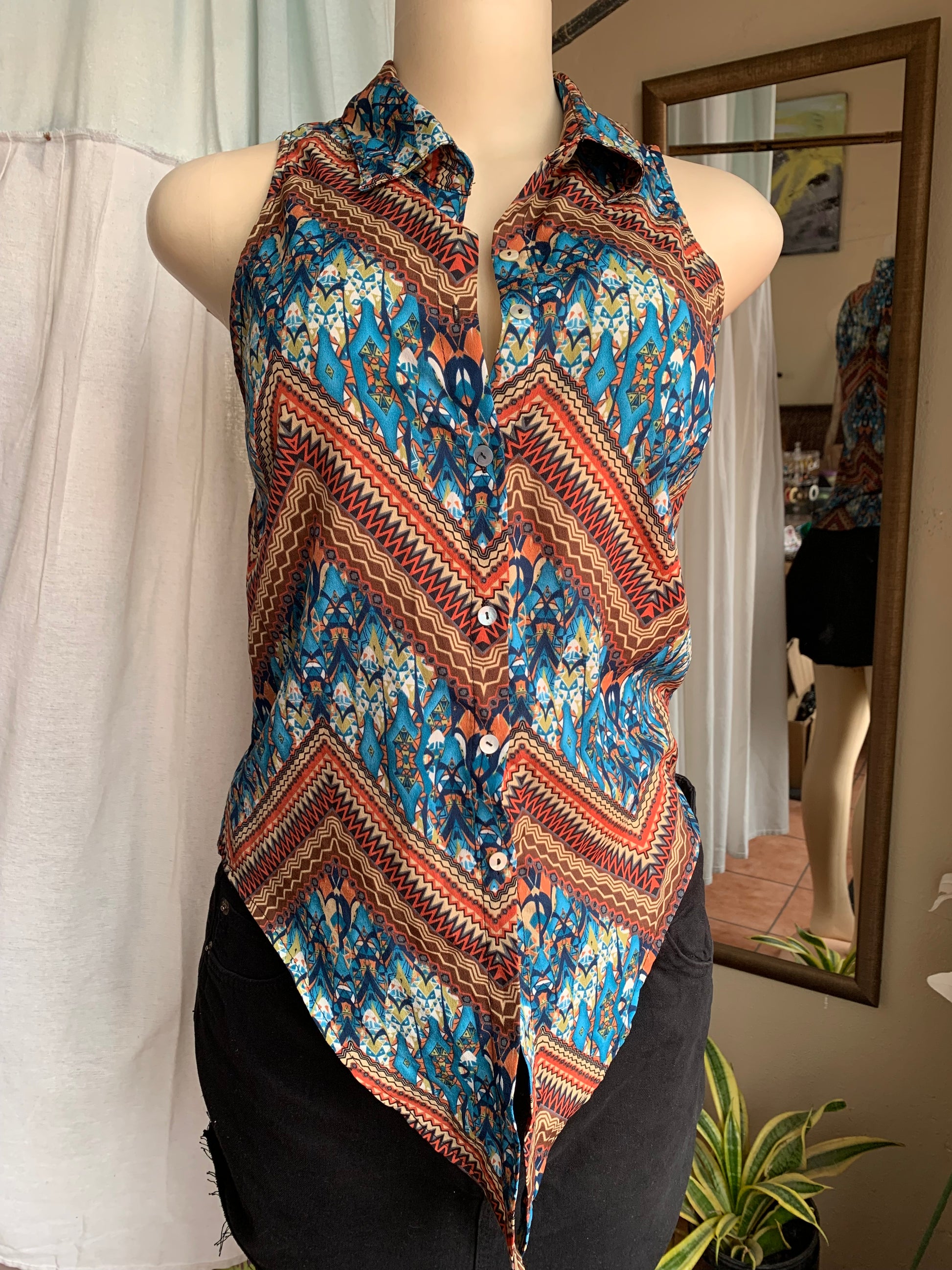 Tribal print sleeveless button down blouse … s
