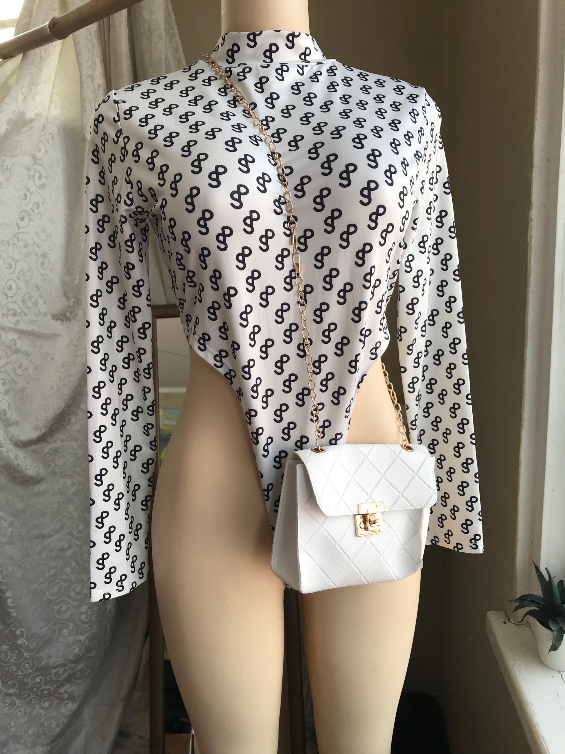 White cross hatch mini crossbody bag with gold chain