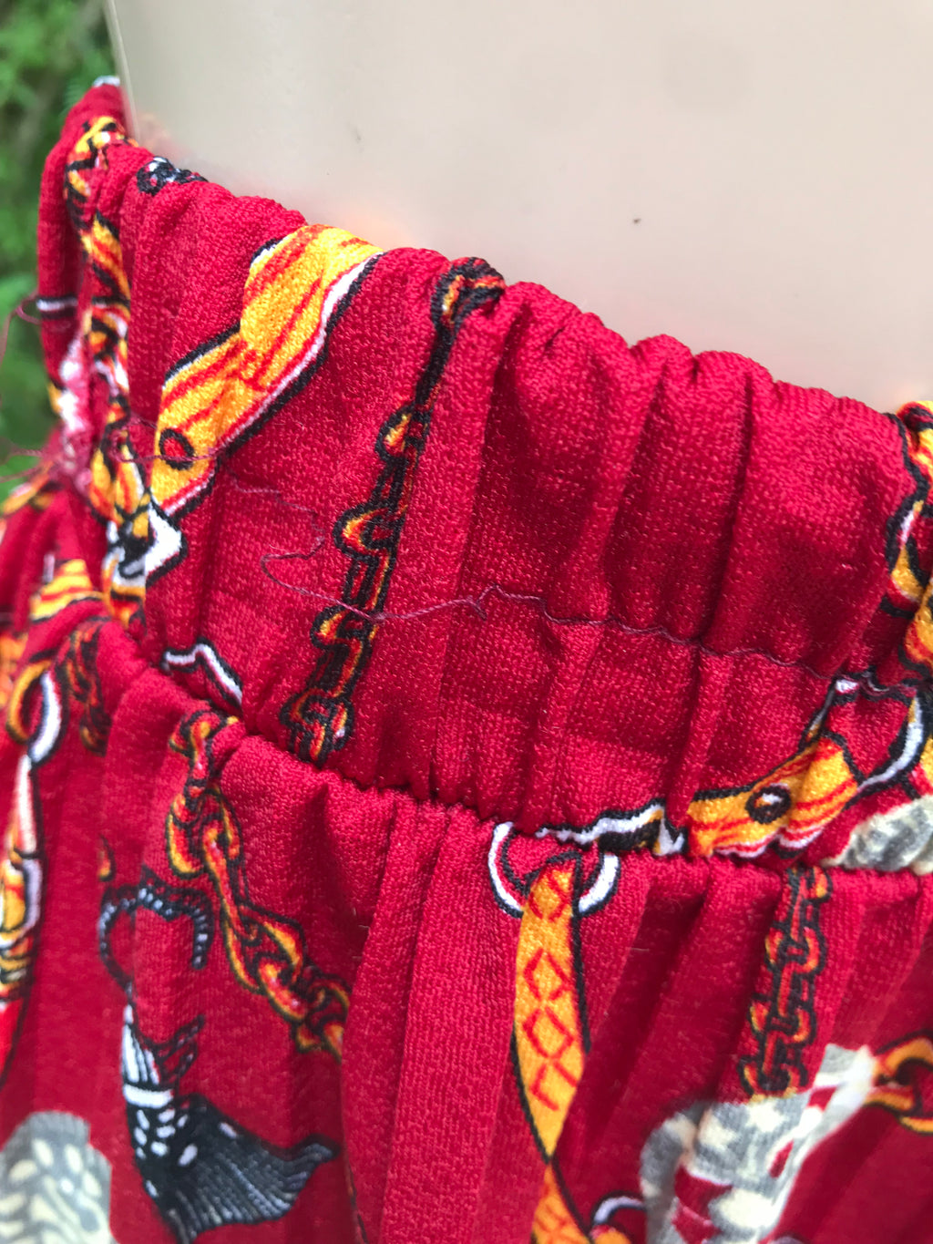 red ornate print pleat high waist shorts . s