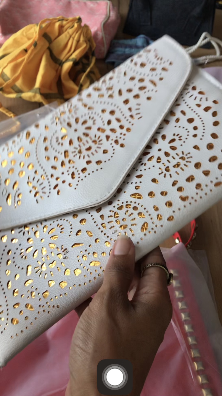 white and gold envelope clutch eyelet