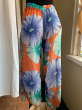 Load image into Gallery viewer, New sheer floral print pants with front slits says small can fit M
