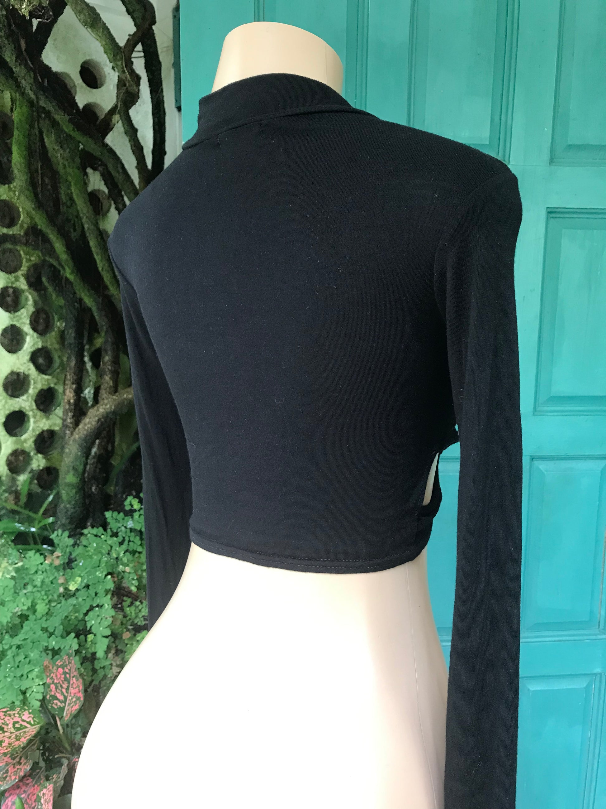 Black cutout turtleneck long sleeve crop top ...