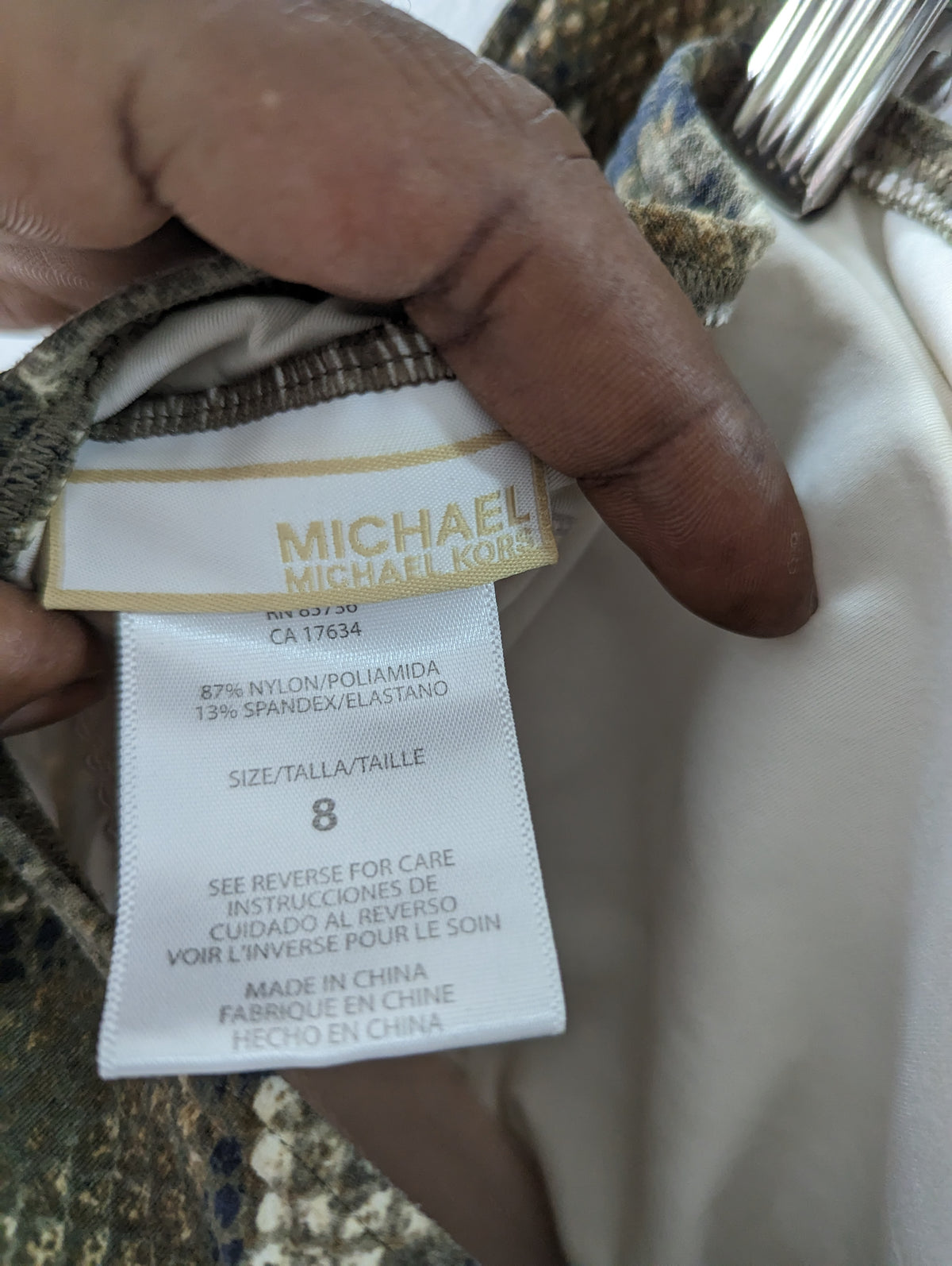 Like new Michael Kors Snakeskin one piece swim suit size 8 / m