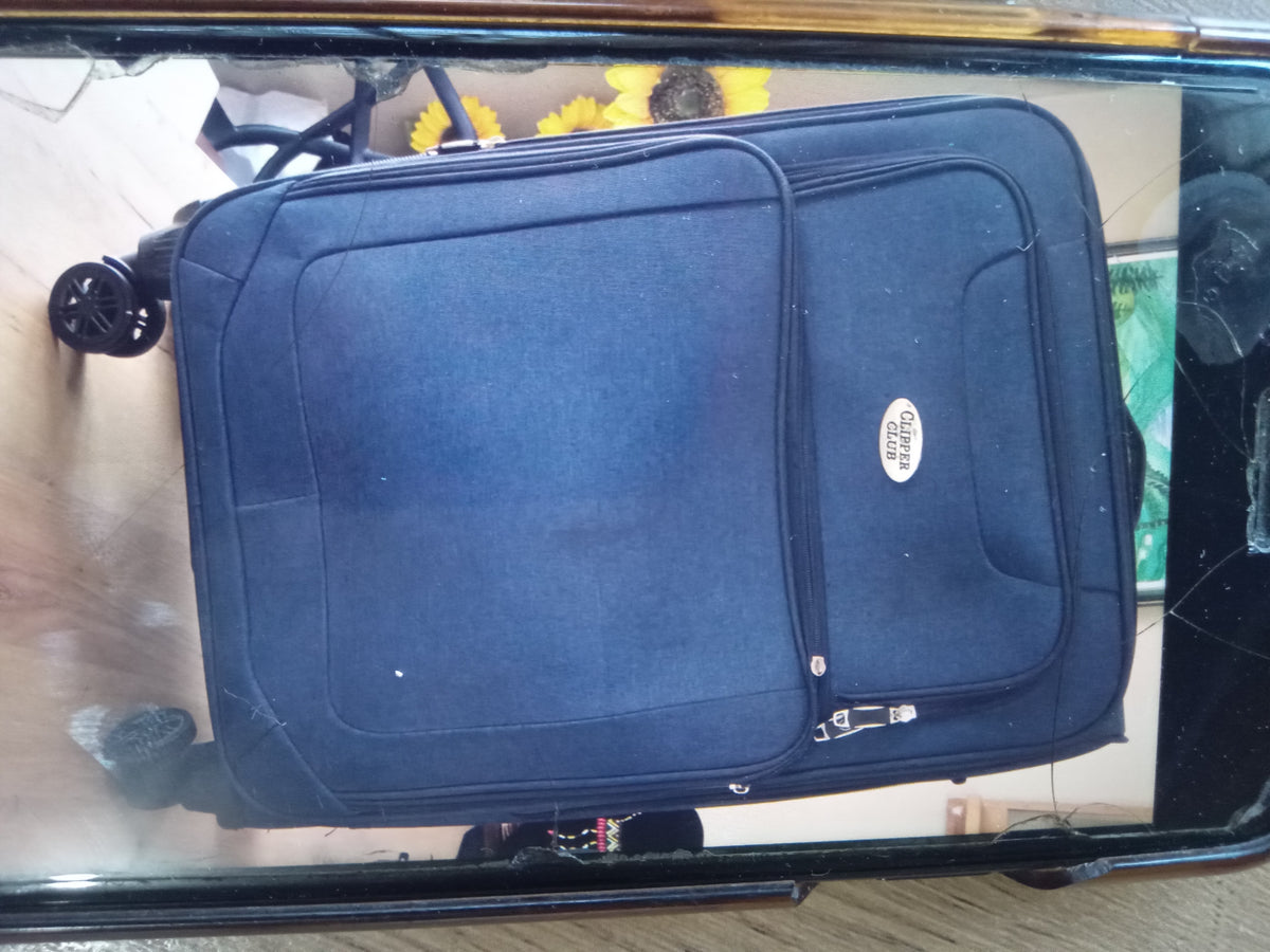 clippers club fluid rolling luggage navy medium