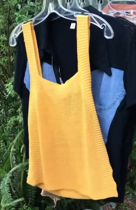 yellow knit sleeveless top. fits large