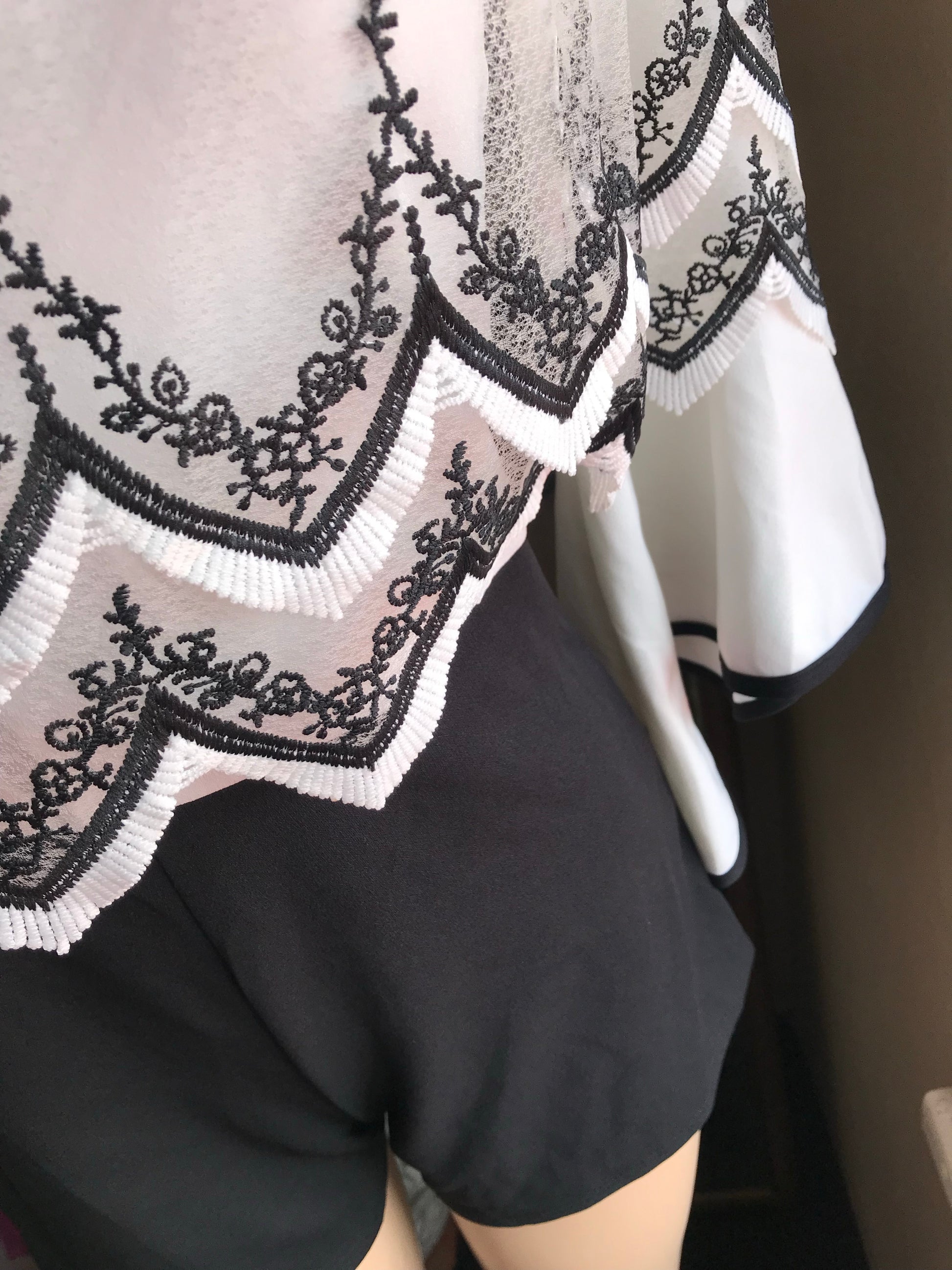 B&W Off-the-Shoulder Trumpet Sleeve Romper w Embroidery Detail - L