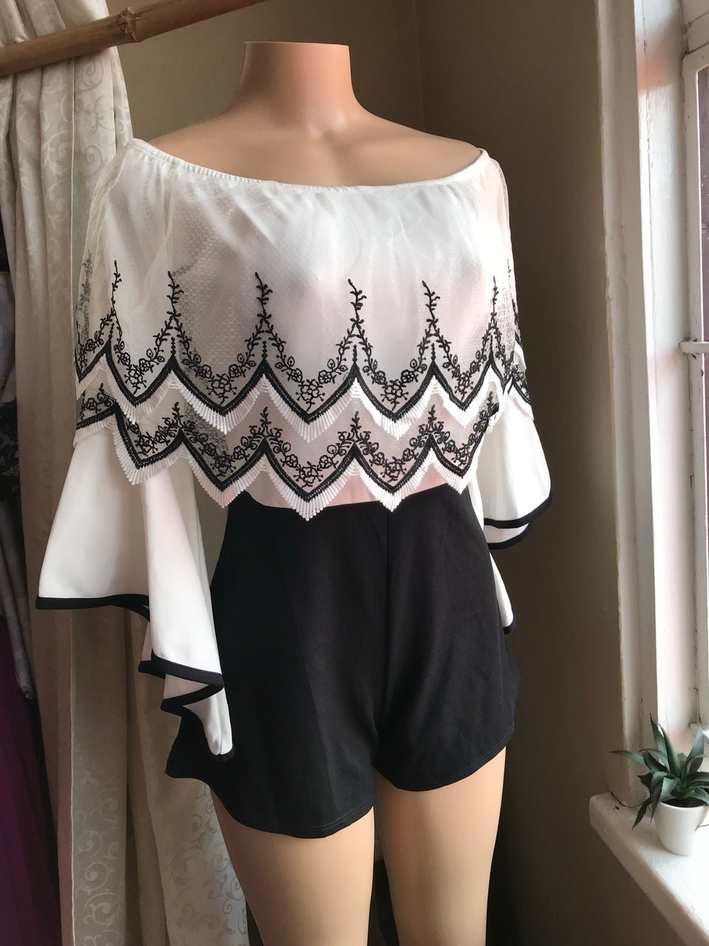 B&W Off-the-Shoulder Trumpet Sleeve Romper w Embroidery Detail - L